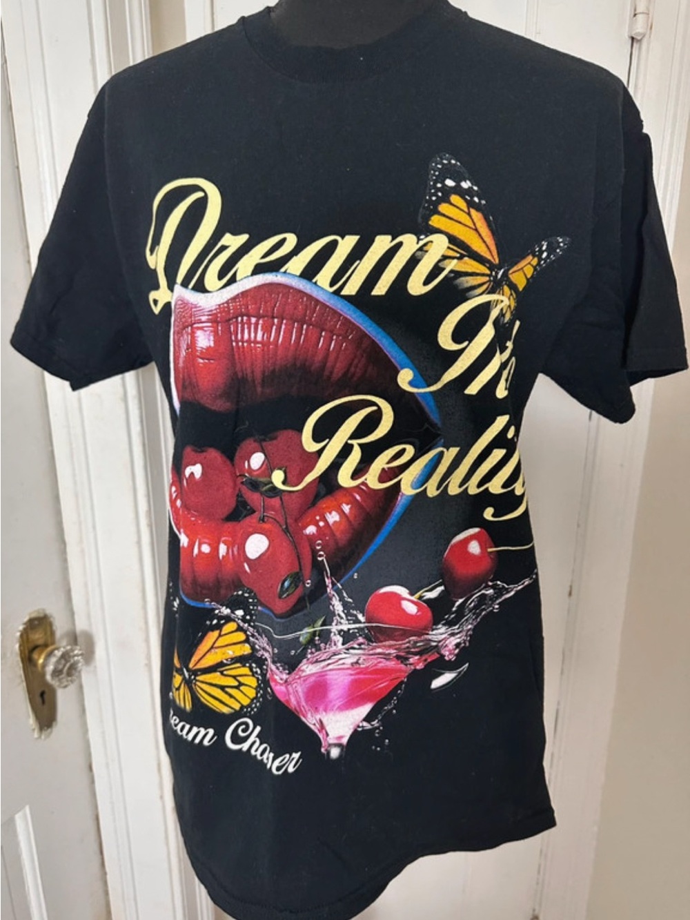Graphic 'Dream In Reality' Black Tee with Red Lip & Cherry Print